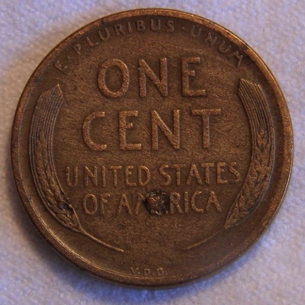 Odd-Damage-On-A-1909-S-VDB-Penny
